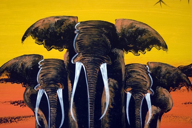 Elephants on a painted wall
